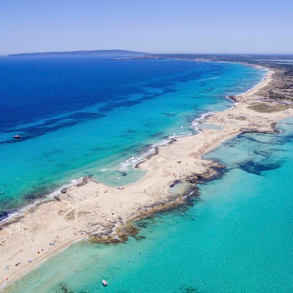 a view of a beach next to a body of water